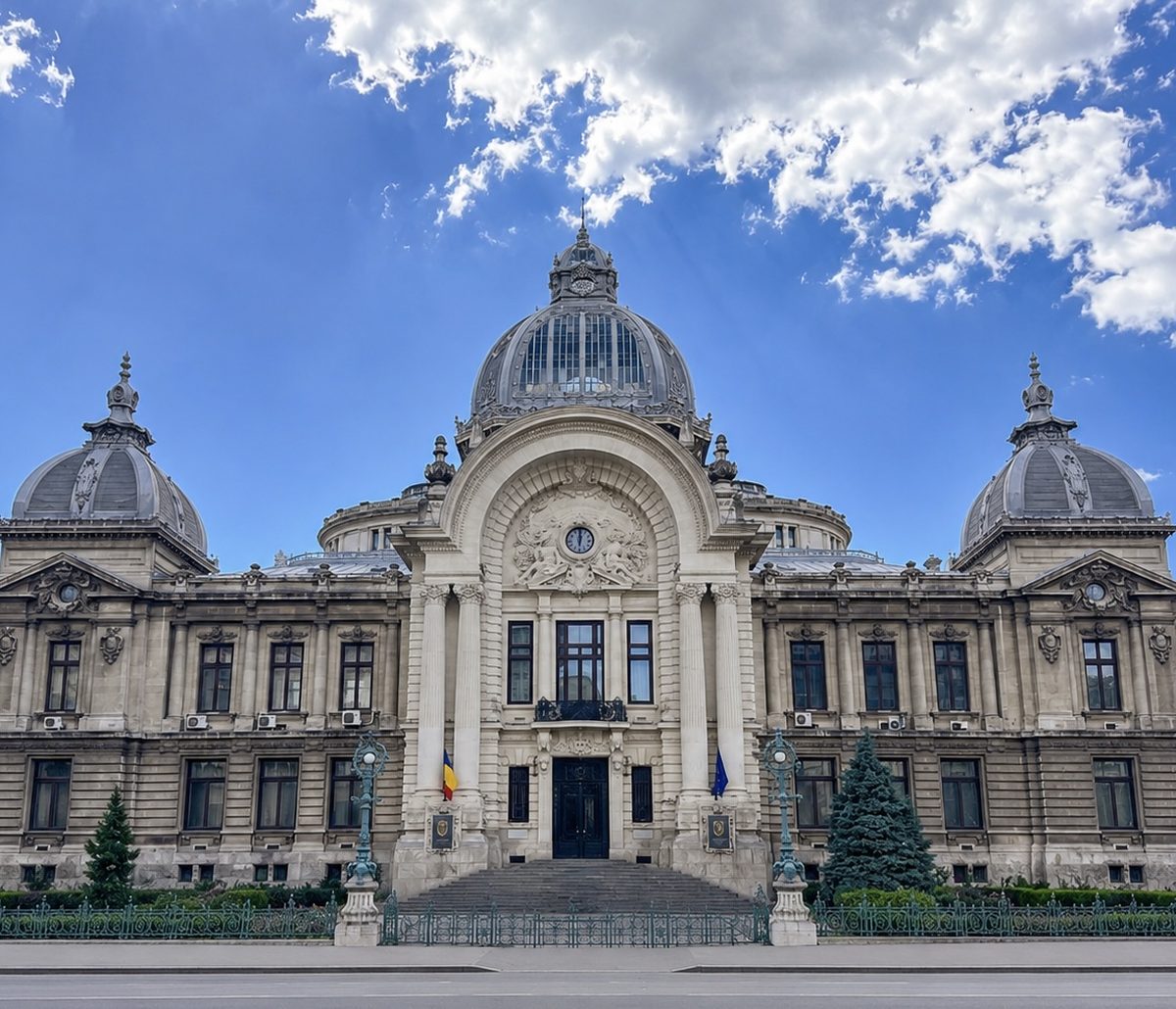 Institutional architecture in Bucharest under a deep blue sky